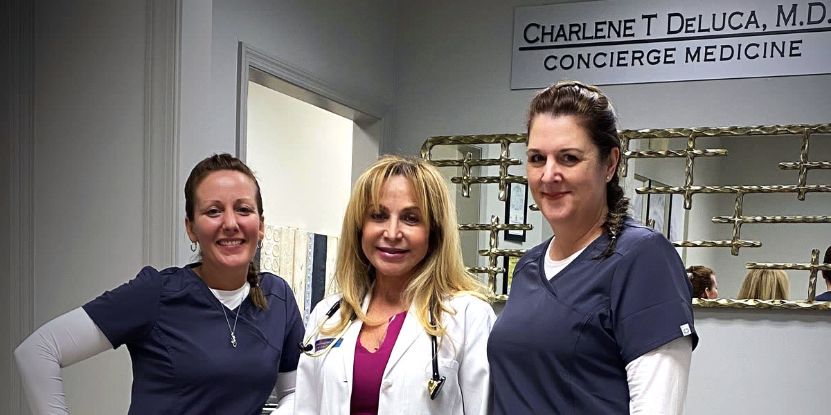 Dr. DeLuca with her care team at the Naples office